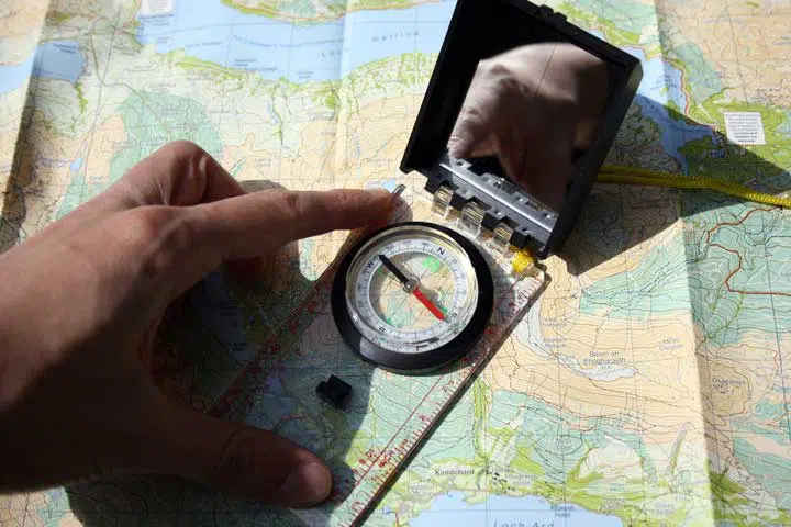 photo of one of my baseplate compasses on a topo map.