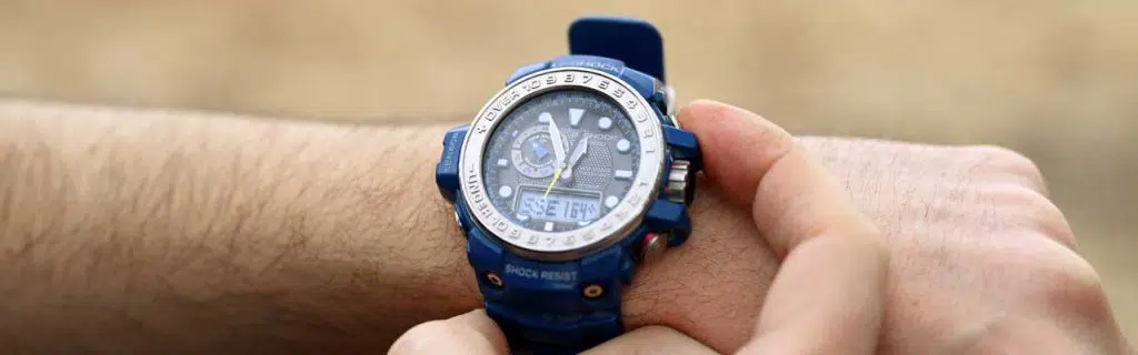 Photo of a compass watch.