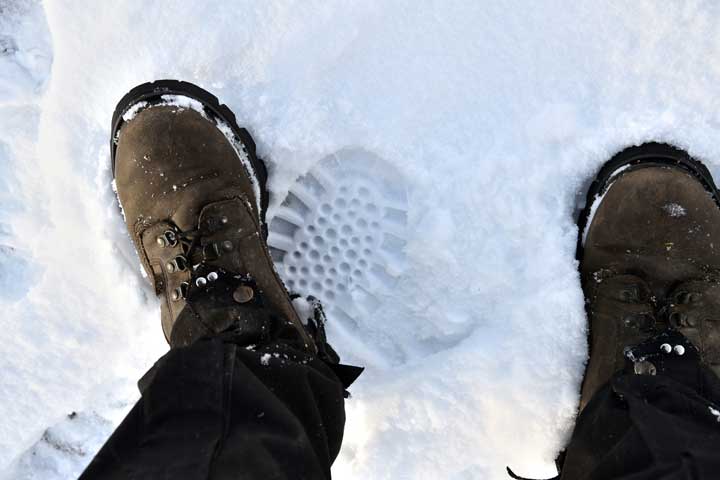 Photo of my hunting boots while wearing them on the snow. 