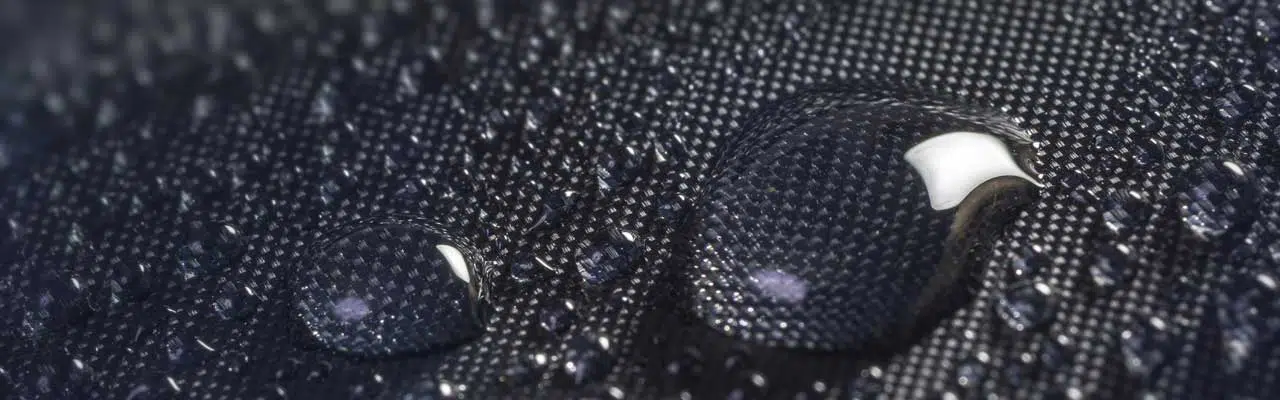 Photo of water sliding through waterproof fabrics.