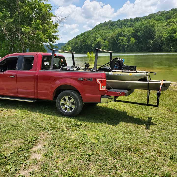truck extender with two kayaks. 