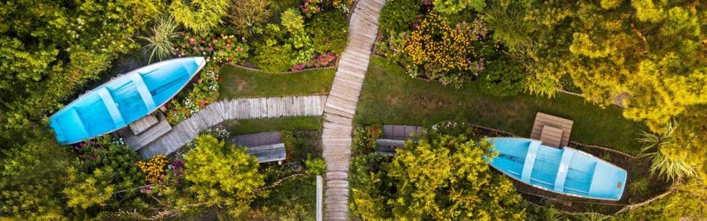 Photo of a park in Florida with two wooden boats