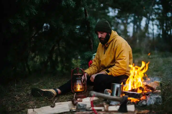 Setting up a shelter in the forest for the night. 