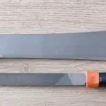 photo of a tramontina bolo machete and a bastard file.