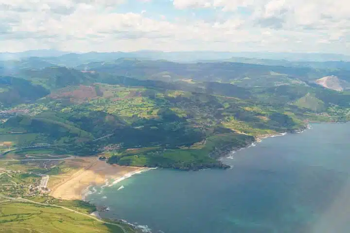 Aerial view from the aircraft window of Bilbao surrounding area. 