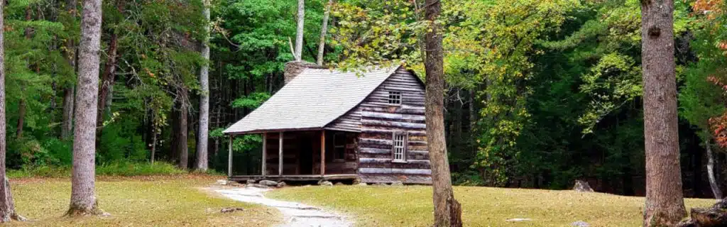 The Carter Shields Cabin is a historical structure located on the eleven-mile, one-way scenic loop through Cades Cove. This small cabin was the home of George Washington “Carter” Shields from 1910 to 1921, but was likely built much earlier around 1880 by William Sparks. Carter Shields, a veteran of the Civil War, was crippled in 1862 at the Battle of Shiloh and retired here (source- https://smokymountains.com/park/cades-cove/carter-shields-cabin/).